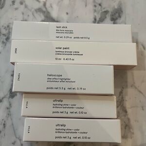 A lot of unopened glossier makeup